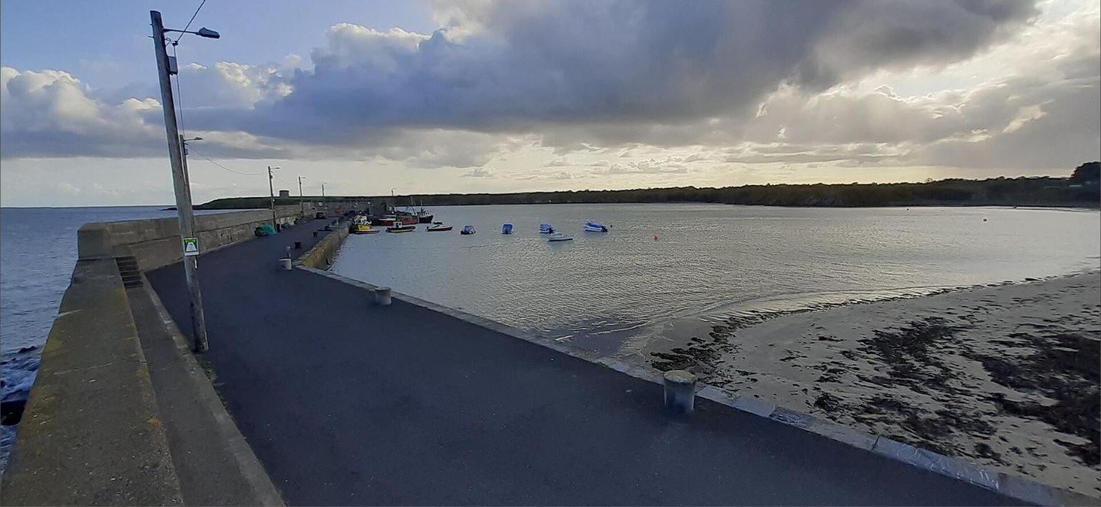 Loughshinny pier and beach on a bright evening