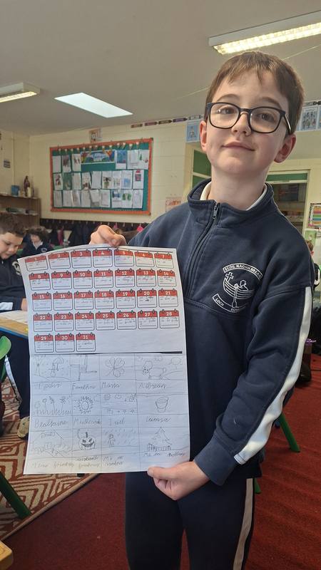 A pupil with his artwork