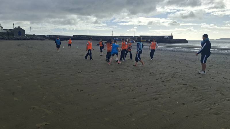 PE on the beach at low tide