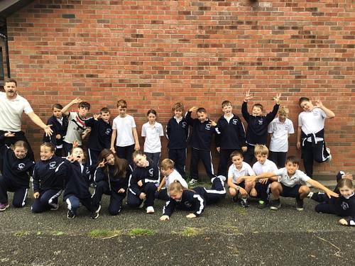 A class having fun for the camera