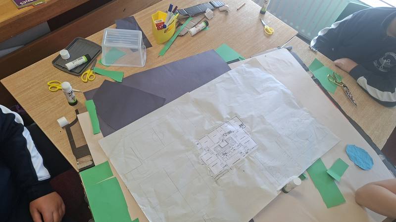 Planning a design on paper at the table