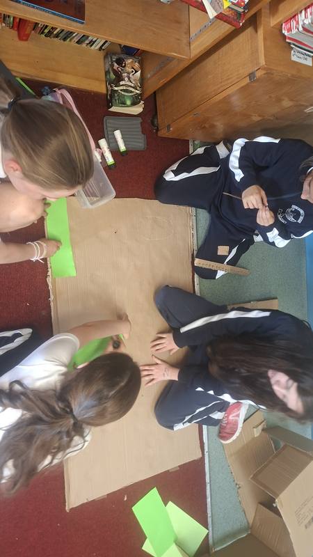 Working together on a project on the floor