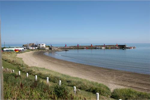 Loughshinny harbour and beach on a clear day