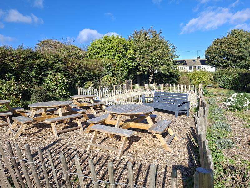 The outdoor classroom among the gardens