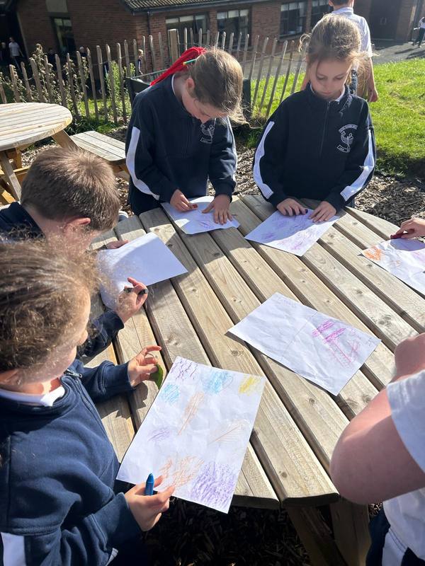 Drawing outdoors at the picnic table